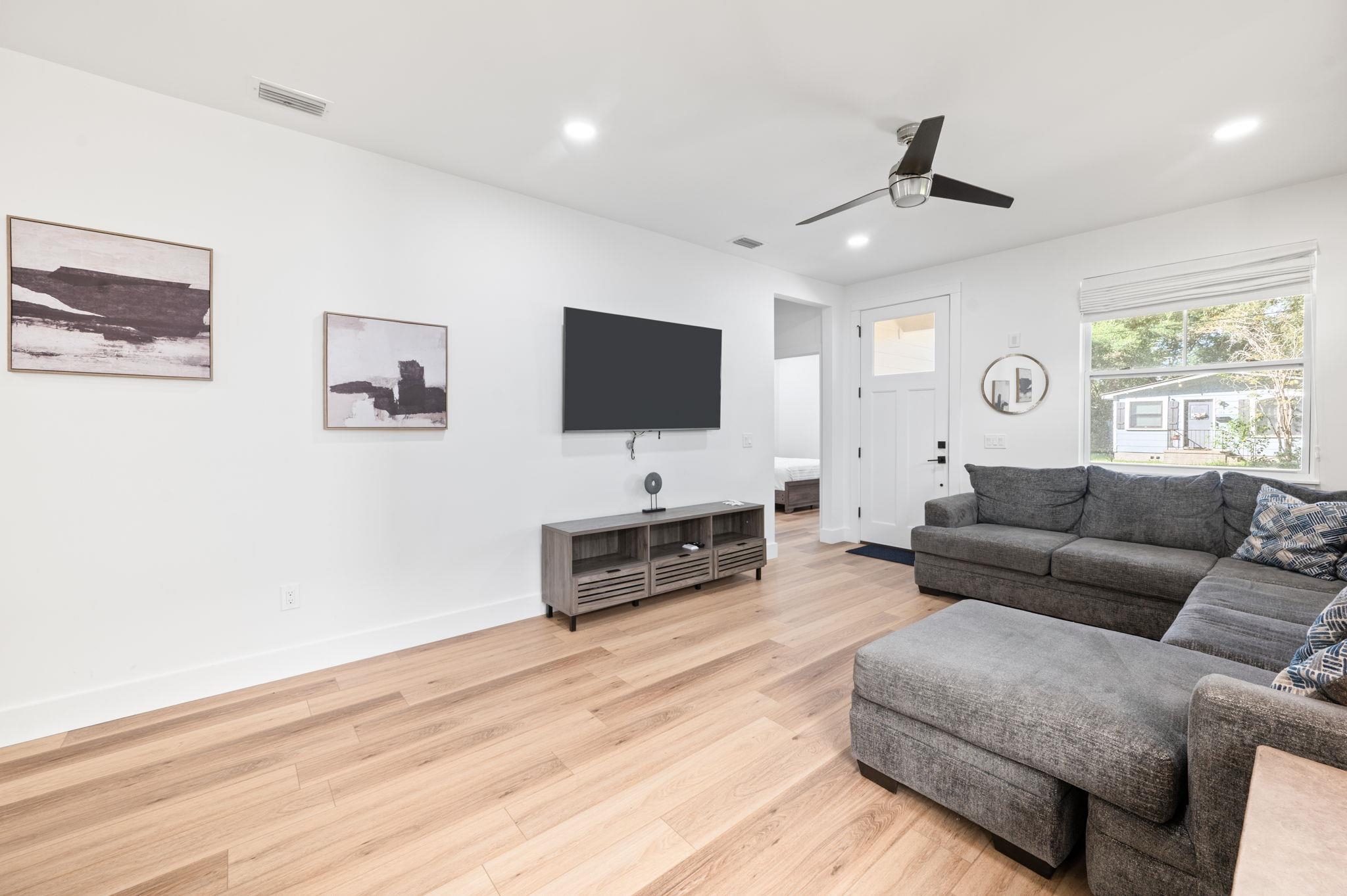 135 Blanco Street St. Augustine, FL 32084 - Photo 5 of 35 a living room with furniture and a flat screen tv