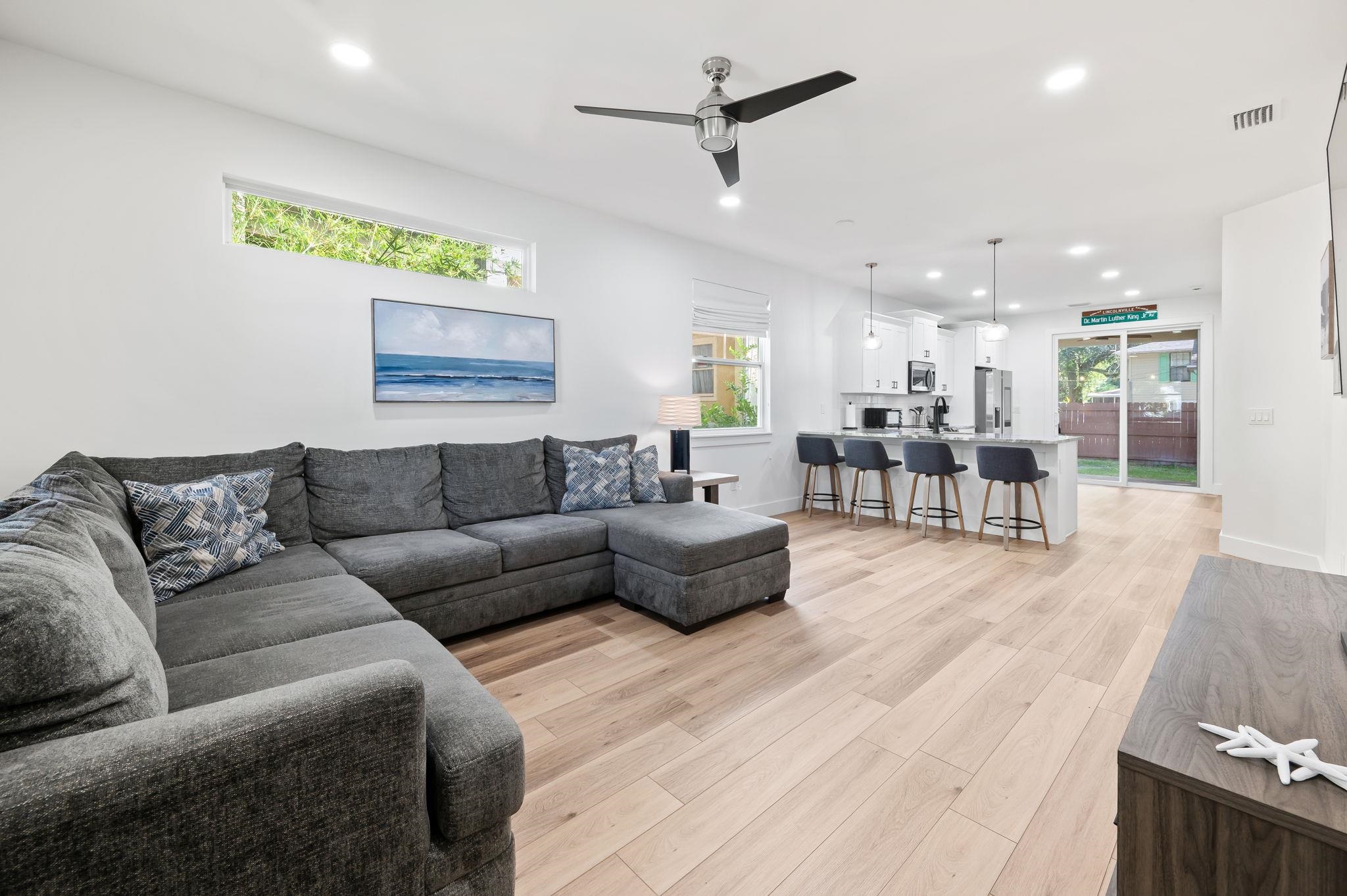 135 Blanco Street St. Augustine, FL 32084 - Photo 6 of 35 a living room with furniture and a wooden floor