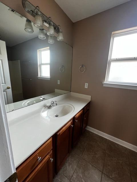 25 3rd Street Shalimar, FL 32579 - Photo 13 of 14 a room with a sink cabinets and a window