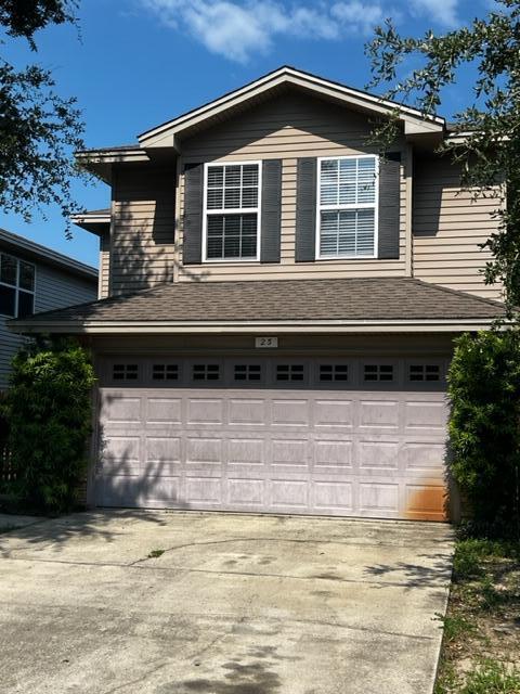 25 3rd Street Shalimar, FL 32579 - Photo 3 of 14 a front view of a house with a yard
