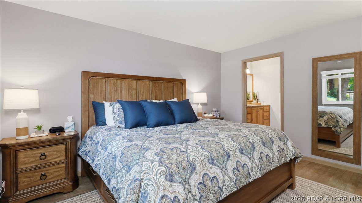 1069 Indian Hill Road Sunrise Beach, MO 65079 - Photo 10 of 54 Primary Bedroom on Main Level
