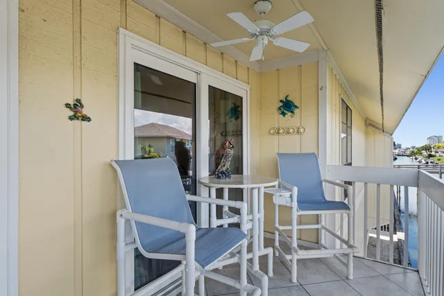 a view of swimming pool from a balcony