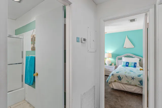 a bedroom with a bed and closet