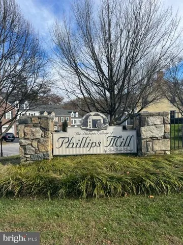 a view of outdoor space with garden and trees