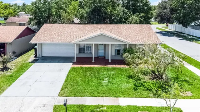 a view of front of house with a yard