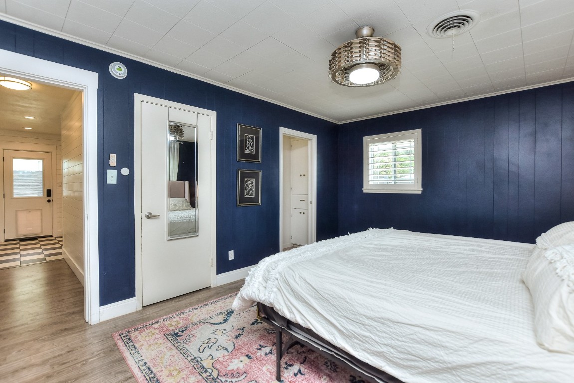 1407 East 19th Street Georgetown, TX 78626 - Photo 14 of 36 a bedroom with a bed and a window