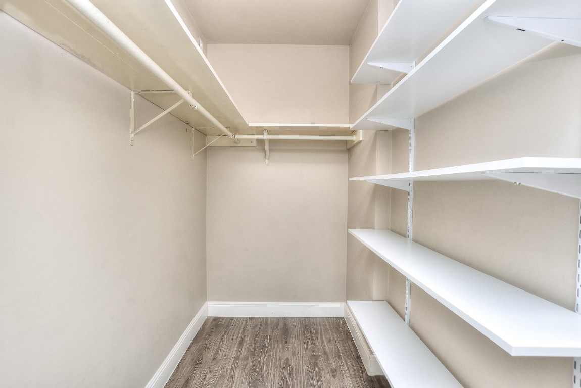 1407 East 19th Street Georgetown, TX 78626 - Photo 16 of 36 a view of an empty walk in closet