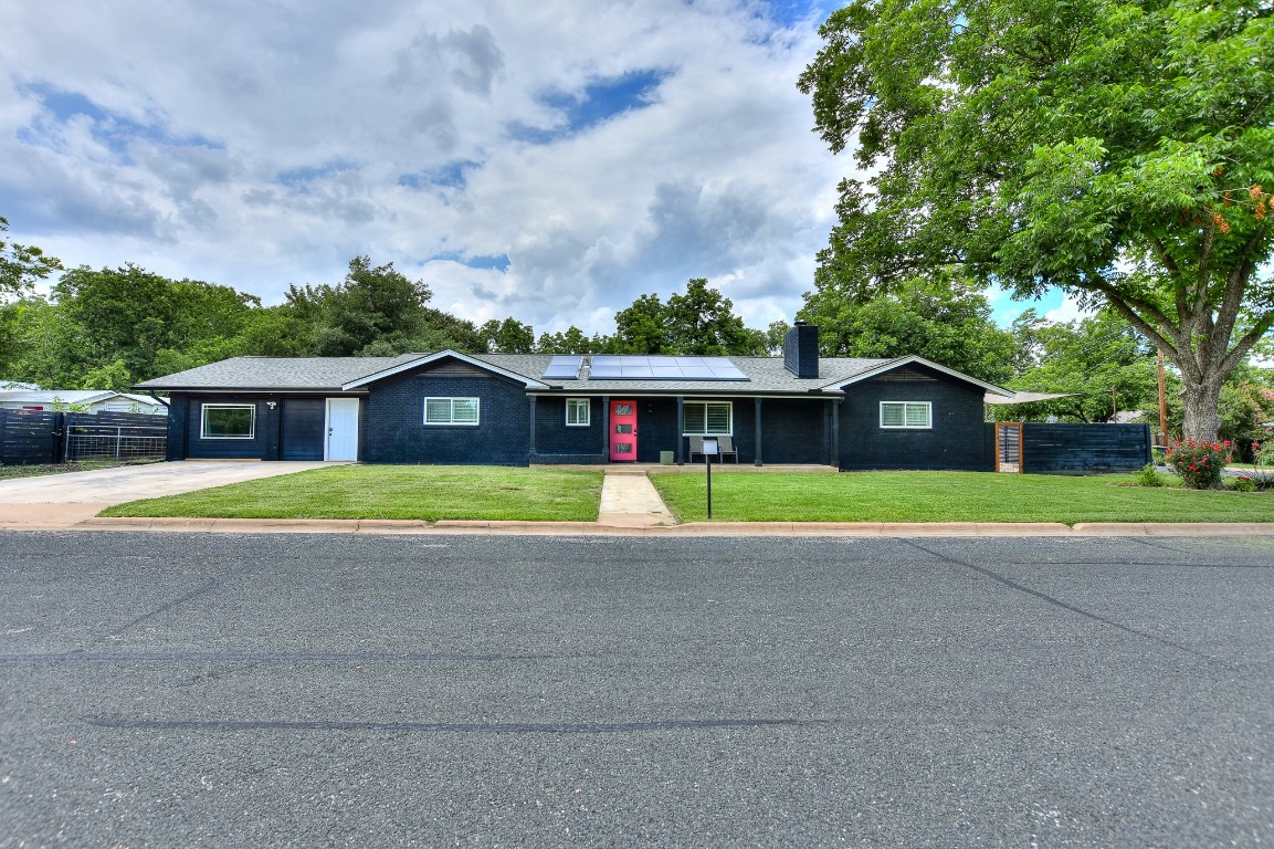 1407 East 19th Street Georgetown, TX 78626 - Photo 2 of 36 a view of house with a swimming pool