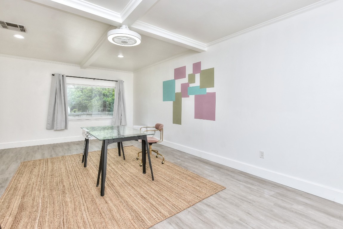 1407 East 19th Street Georgetown, TX 78626 - Photo 30 of 36 a workspace room with furniture and wooden floor