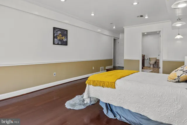 a bathroom with a tub and shower