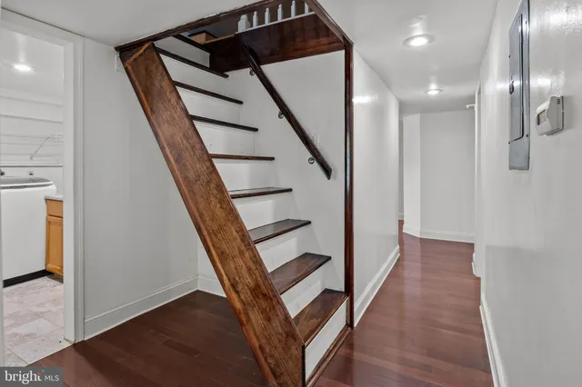 a view of a livingroom with wooden floor