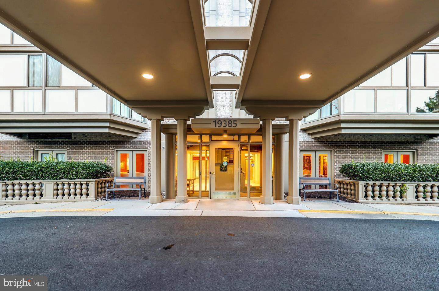 19385 Cypress Ridge Terrace, Unit 914 Leesburg, VA 20176 - Photo 24 of 39 a view of a building with porch