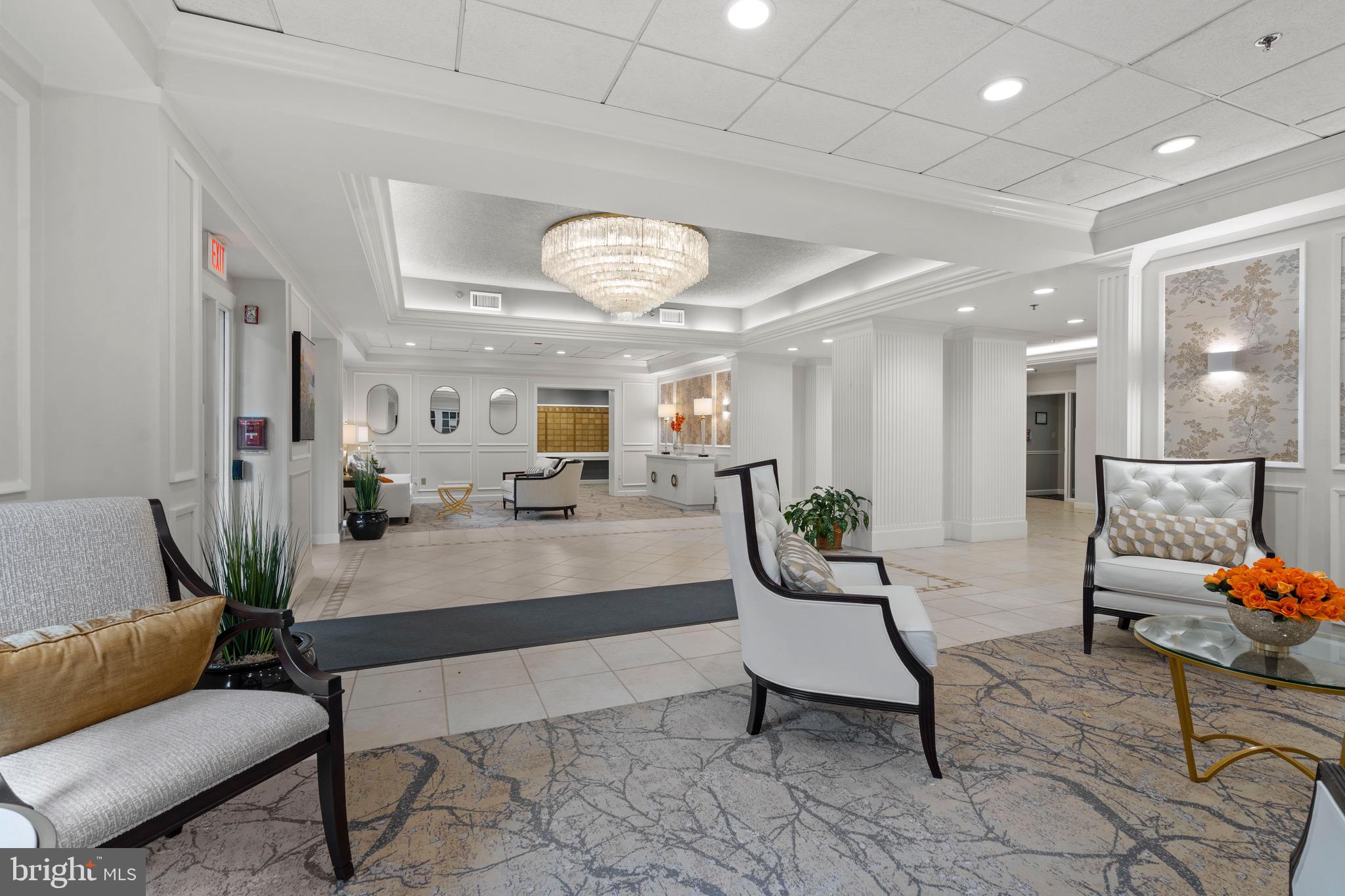 19385 Cypress Ridge Terrace, Unit 914 Leesburg, VA 20176 - Photo 3 of 39 a living room with furniture