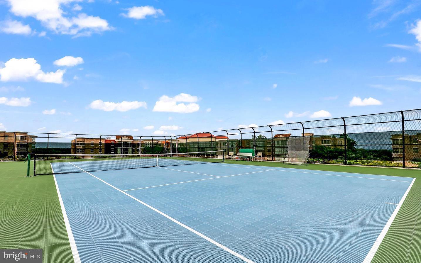 19385 Cypress Ridge Terrace, Unit 914 Leesburg, VA 20176 - Photo 31 of 39 a view of a tennis court