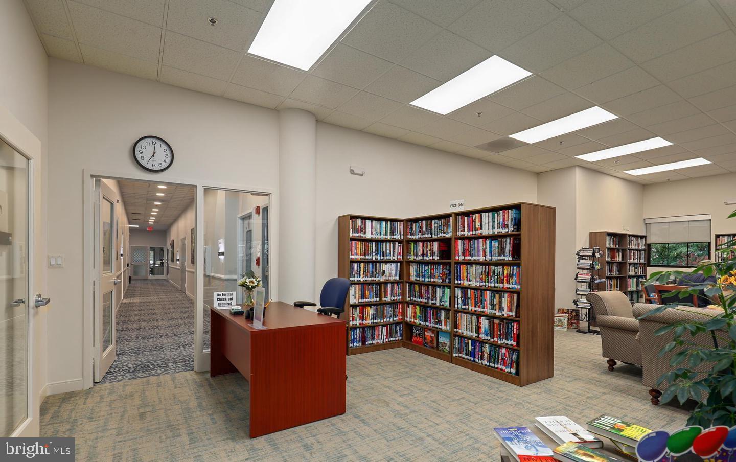 19385 Cypress Ridge Terrace, Unit 914 Leesburg, VA 20176 - Photo 32 of 39 a view of a livingroom with furniture and staircase