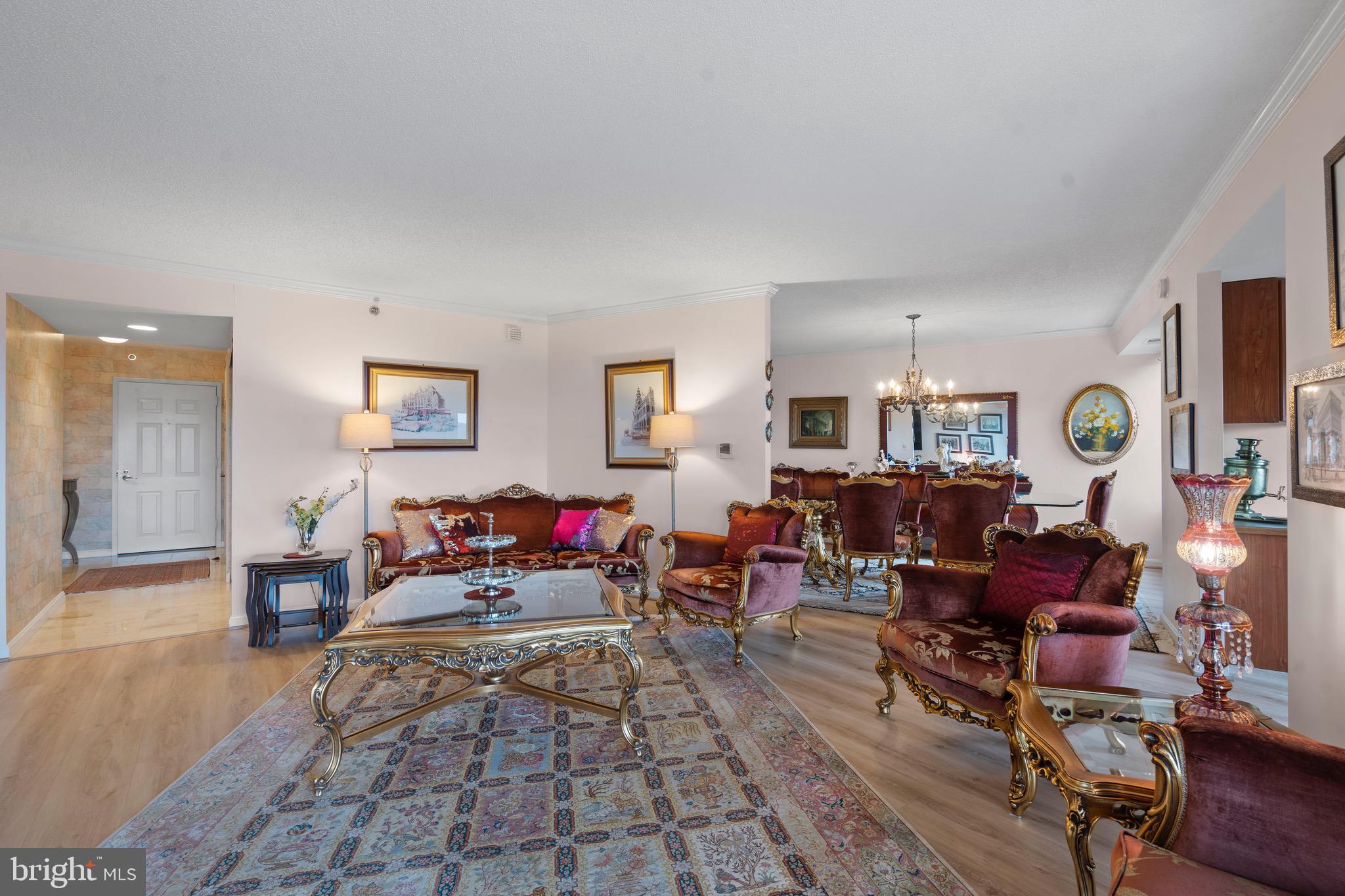 19385 Cypress Ridge Terrace, Unit 914 Leesburg, VA 20176 - Photo 5 of 39 a living room with furniture and a window