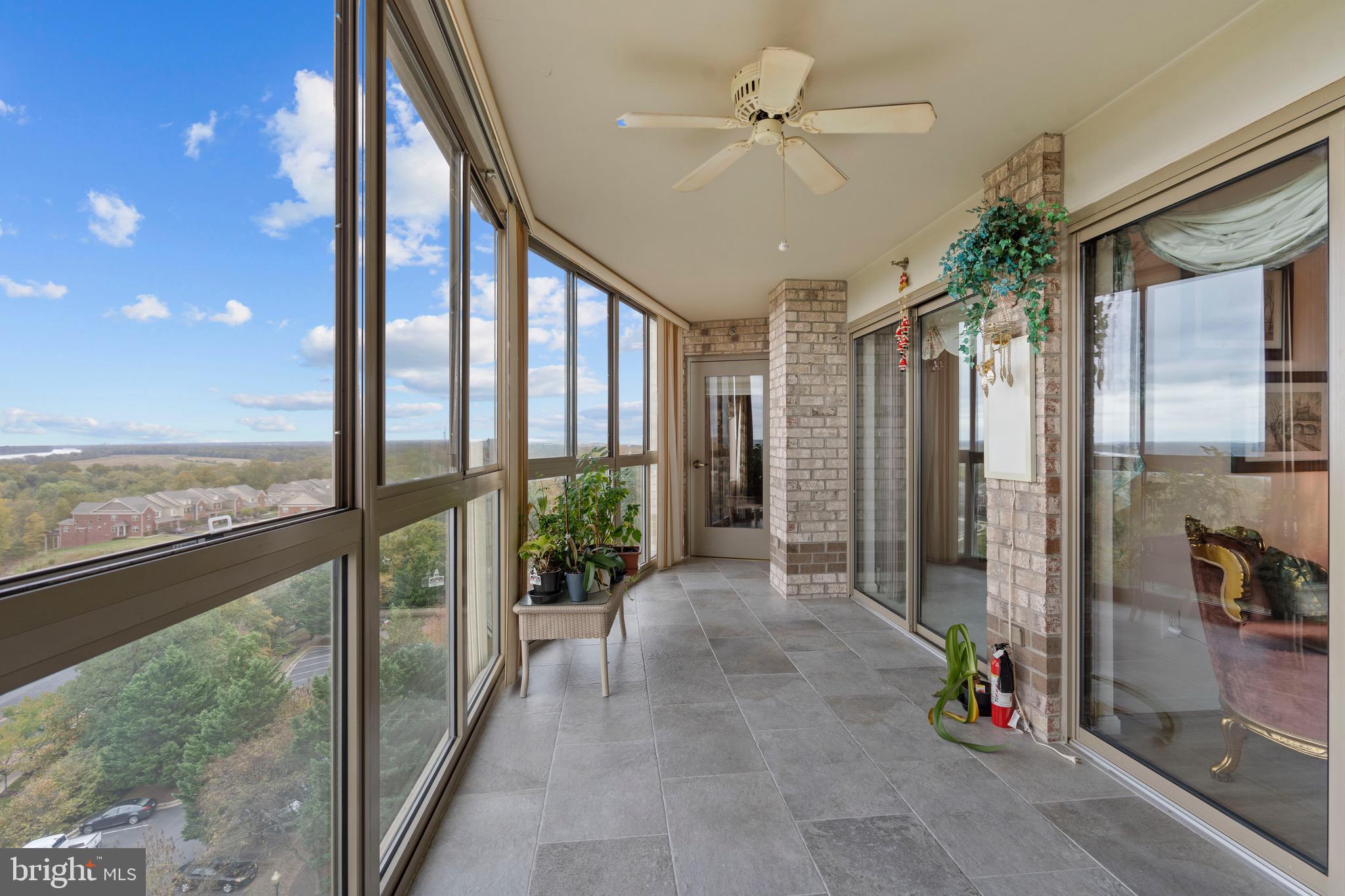 19385 Cypress Ridge Terrace, Unit 914 Leesburg, VA 20176 - Photo 9 of 39 a view of interior space with a floor to ceiling window and floor to ceiling window