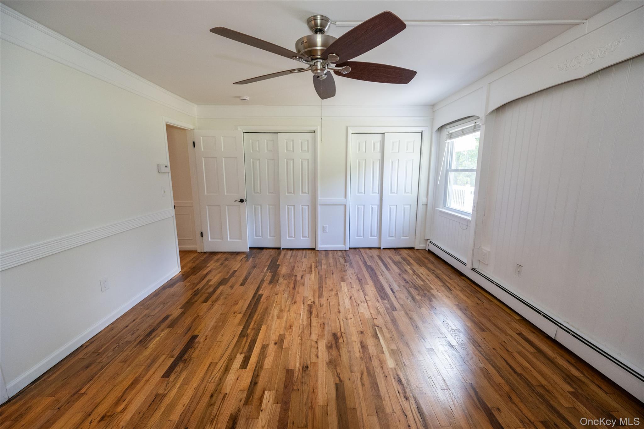 136 Foggintown Road Brewster, NY 10509 - Photo 23 of 50 a view of empty room with wooden floor