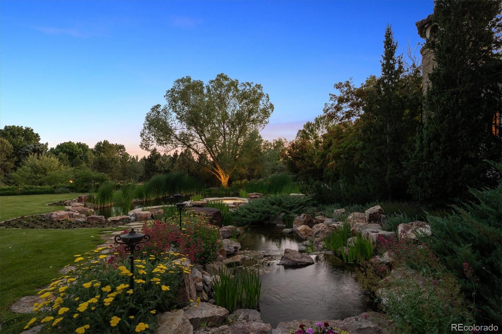 12 Lynn Road Cherry Hills Village, CO 80113 - Photo 15 of 50 a view of a lake with outdoor space