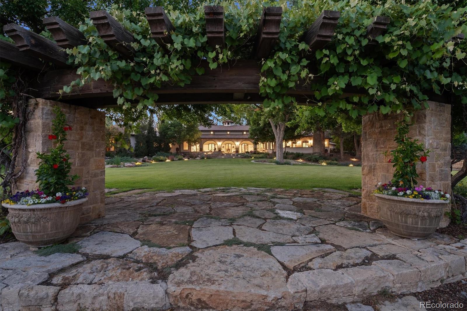 12 Lynn Road Cherry Hills Village, CO 80113 - Photo 16 of 50 a view of a garden with chair and tables