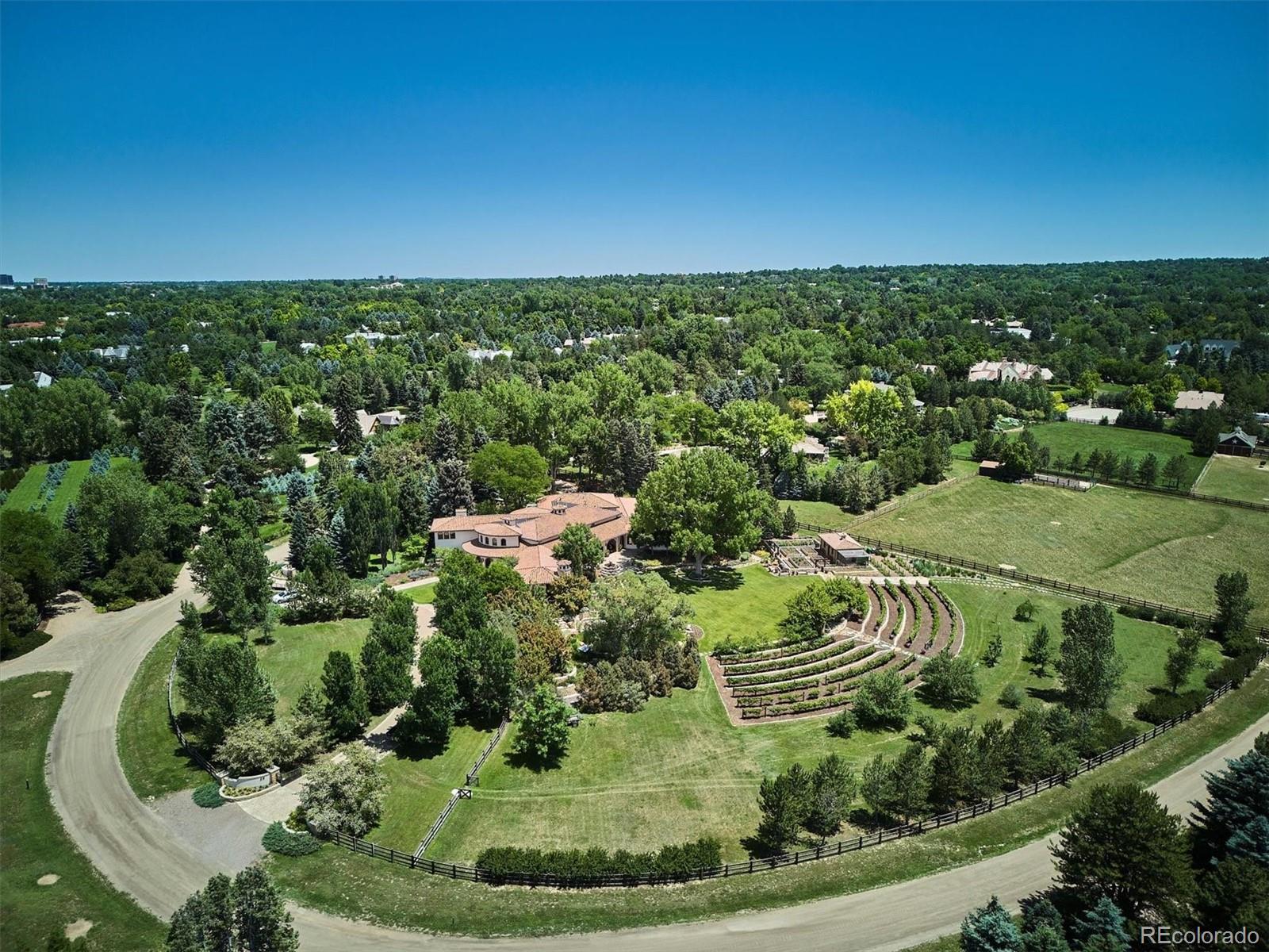12 Lynn Road Cherry Hills Village, CO 80113 - Photo 17 of 50 an aerial view of a house with a yard