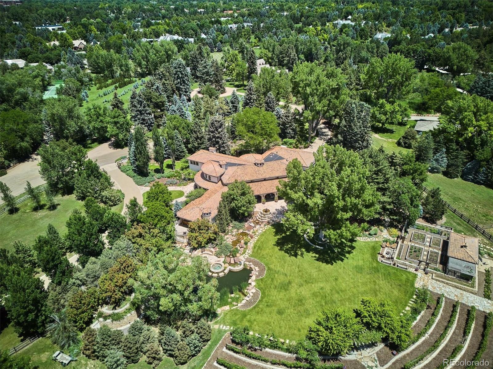 12 Lynn Road Cherry Hills Village, CO 80113 - Photo 18 of 50 an aerial view of residential house with outdoor space and trees all around