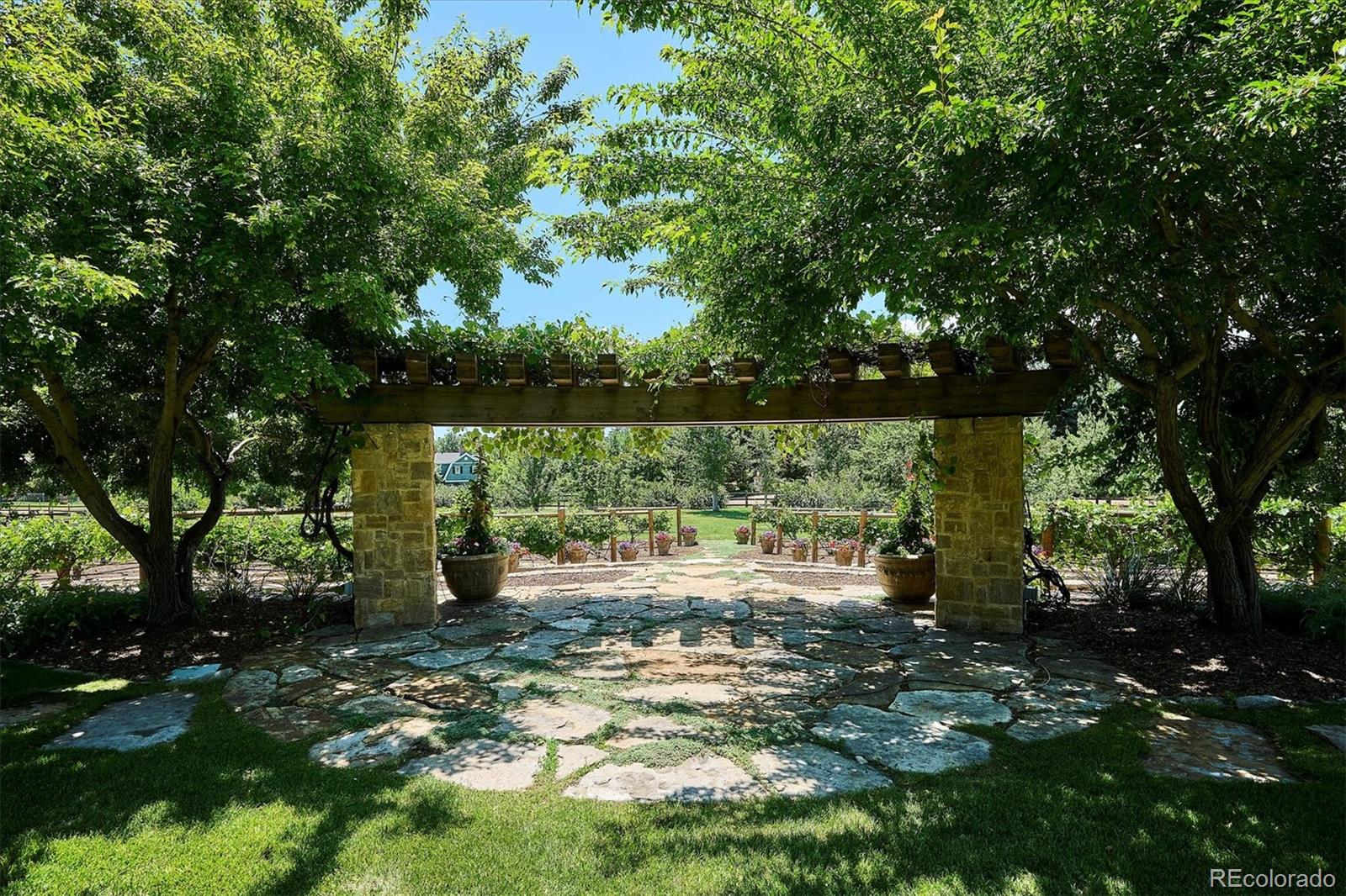 12 Lynn Road Cherry Hills Village, CO 80113 - Photo 20 of 50 a large body of water with a tree in the background