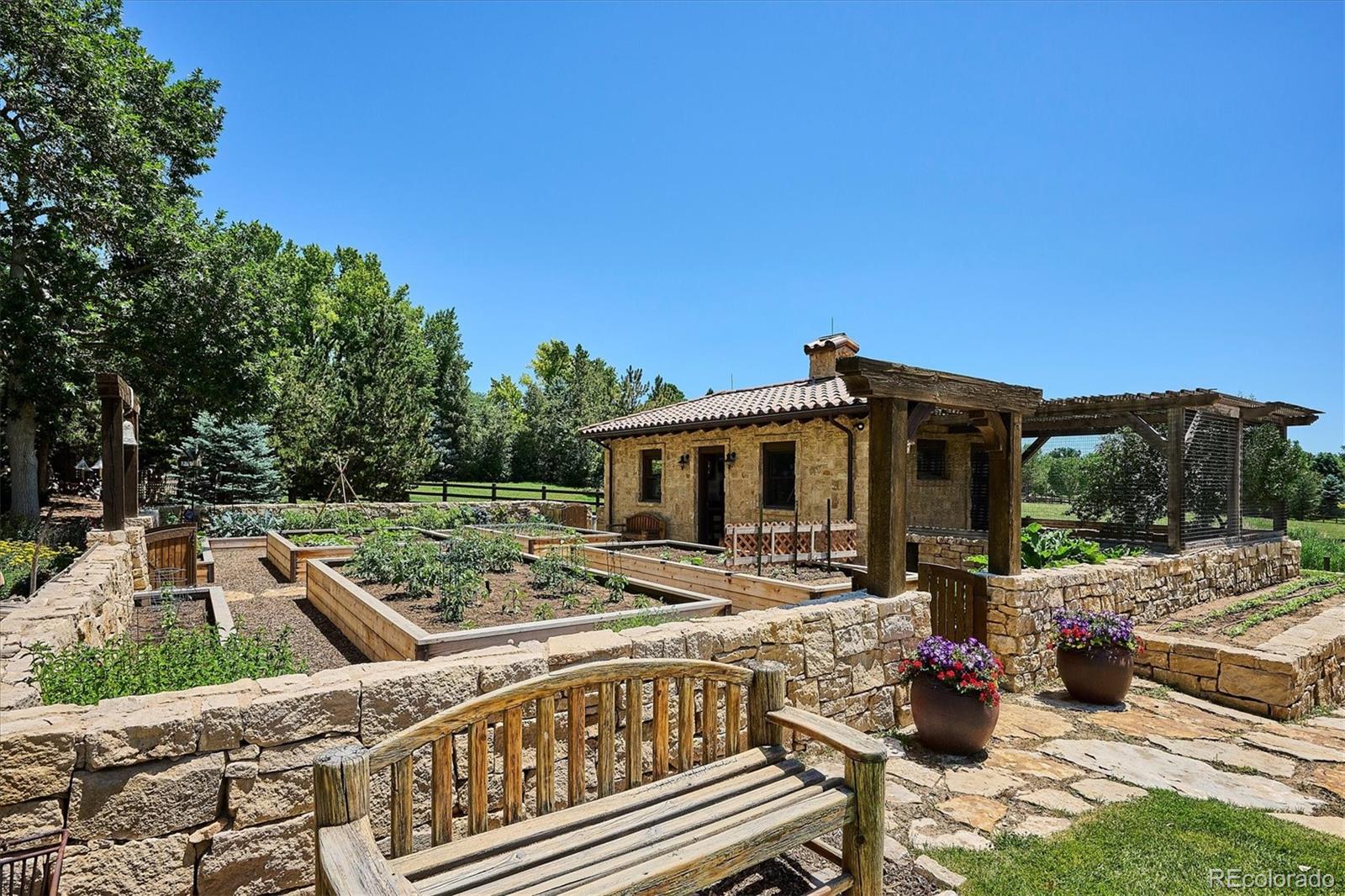12 Lynn Road Cherry Hills Village, CO 80113 - Photo 22 of 50 a view of a patio with couches chairs and potted plants