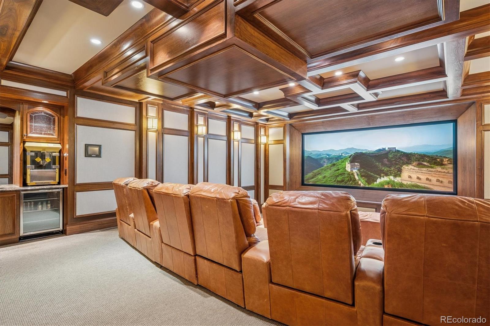 12 Lynn Road Cherry Hills Village, CO 80113 - Photo 32 of 50 a living room with furniture a flat screen tv and a large window