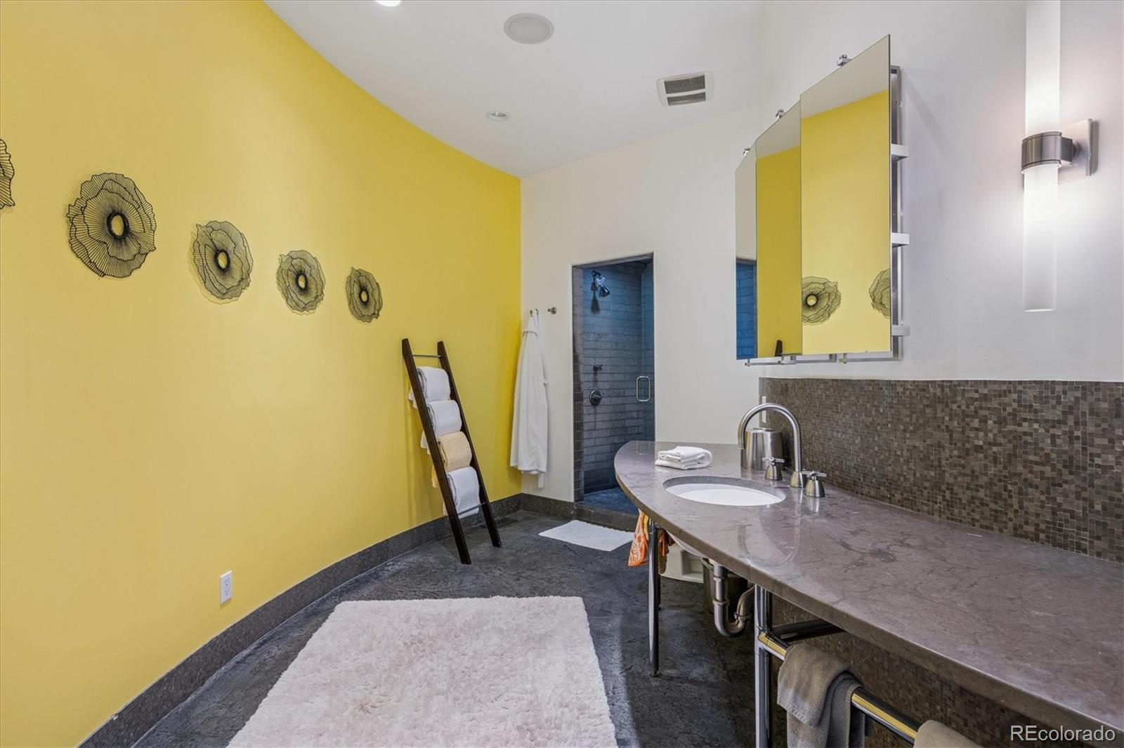 12 Lynn Road Cherry Hills Village, CO 80113 - Photo 38 of 50 a bathroom with a sink and a mirror