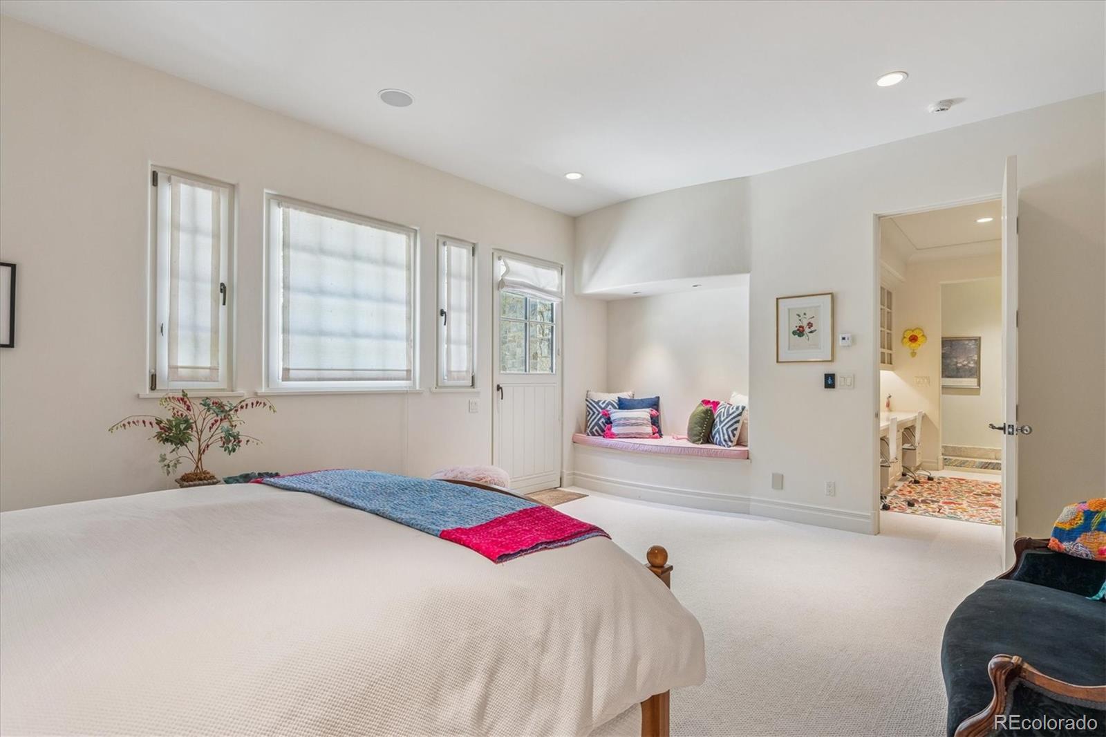 12 Lynn Road Cherry Hills Village, CO 80113 - Photo 41 of 50 a bedroom with a bed and a couch