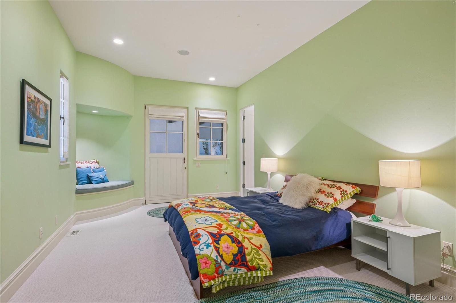 12 Lynn Road Cherry Hills Village, CO 80113 - Photo 43 of 50 a bedroom with a bed and a painting on the wall