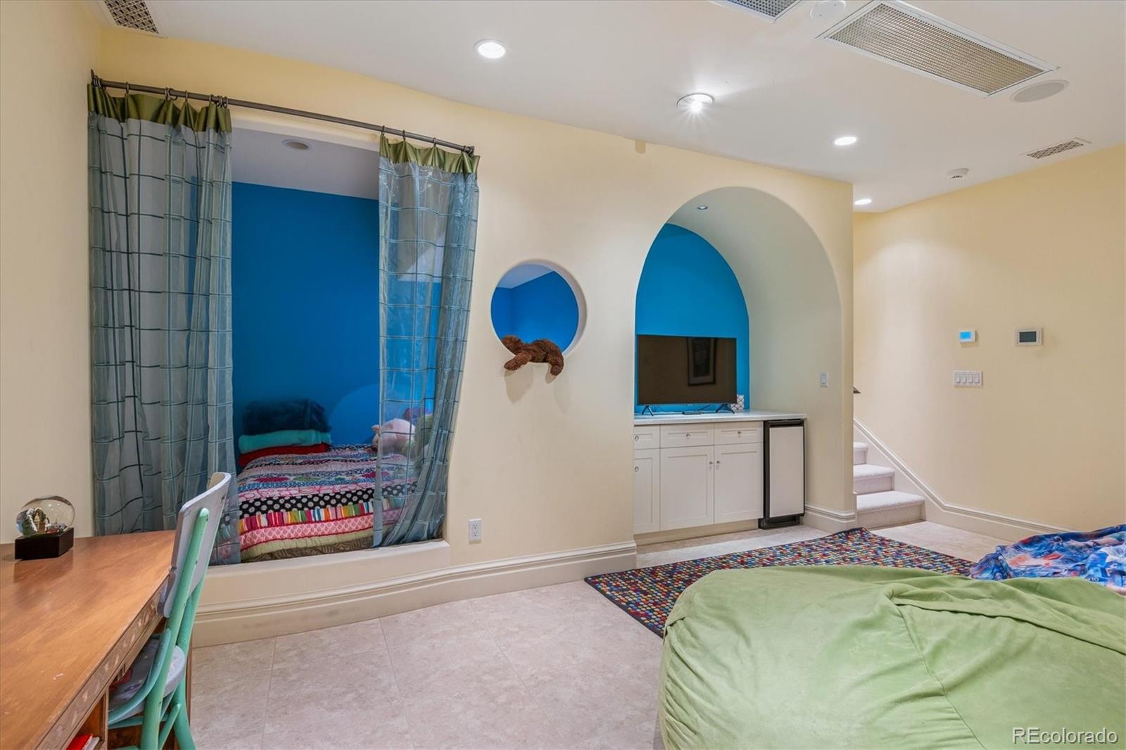 12 Lynn Road Cherry Hills Village, CO 80113 - Photo 45 of 50 a bedroom with a bed and a bathroom