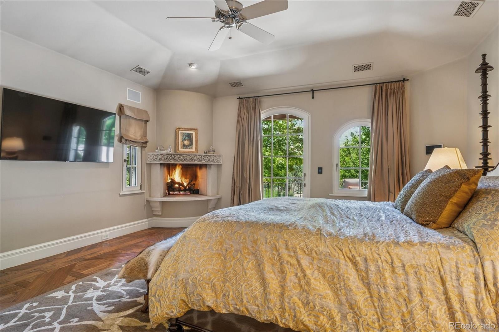 12 Lynn Road Cherry Hills Village, CO 80113 - Photo 7 of 50 a bed sitting in a spacious bedroom next to a window