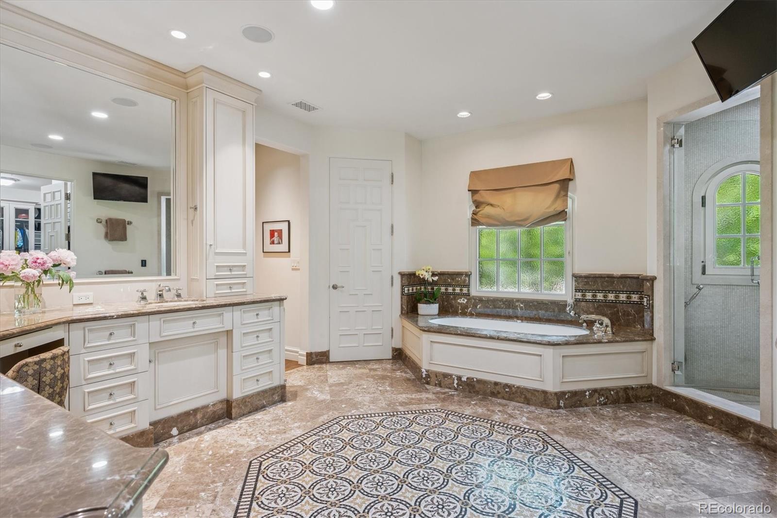 12 Lynn Road Cherry Hills Village, CO 80113 - Photo 8 of 50 a bathroom with a sink a toilet and bathtub