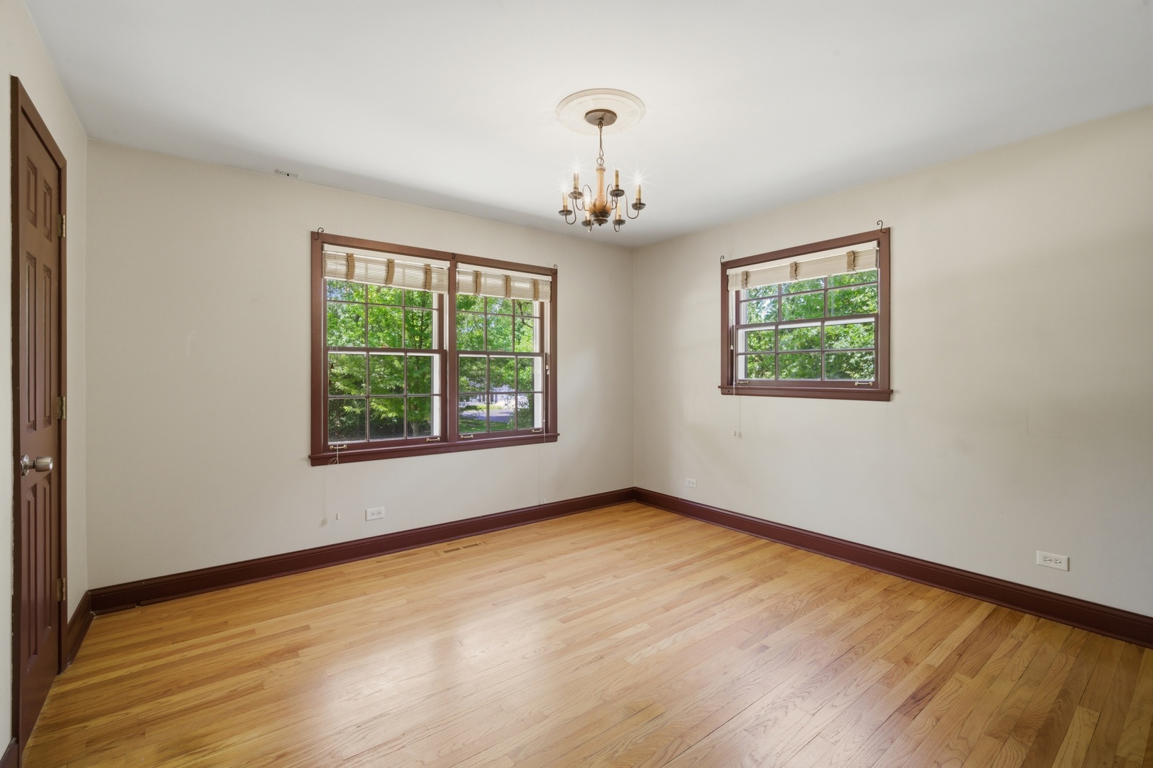 237 Beachview Lane North Barrington, IL 60010 - Photo 16 of 26 a view of an empty room with a window and wooden floor