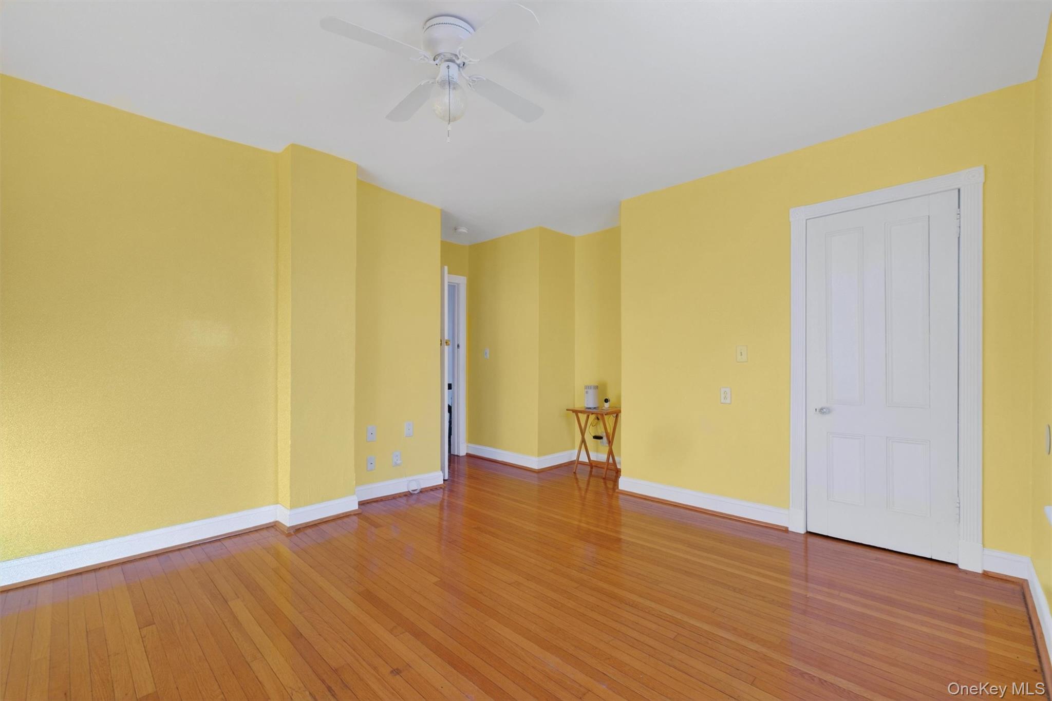75 Prospect Street Newburgh, NY 12550 - Photo 25 of 37 a view of an empty room with wooden floor