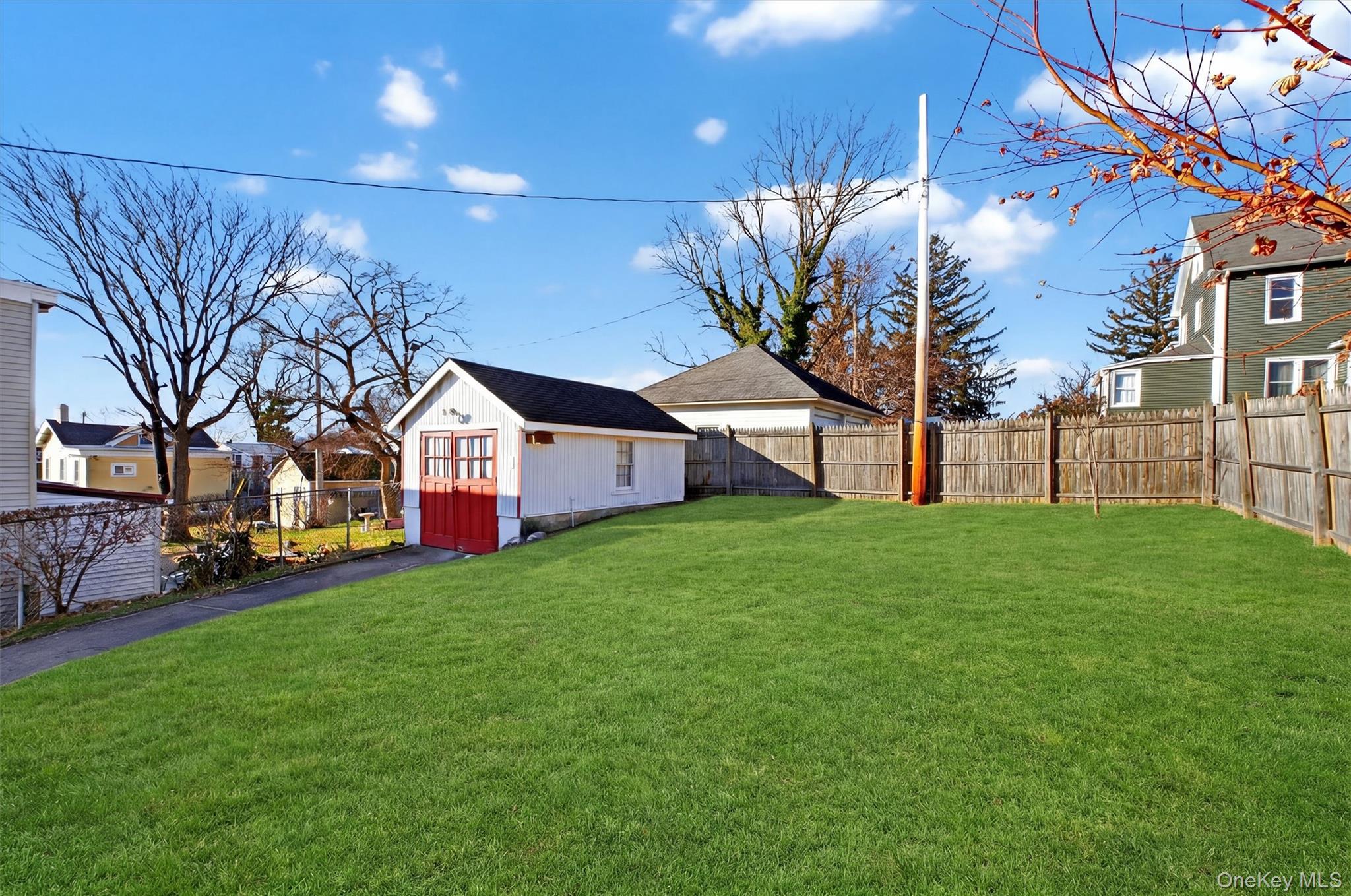 75 Prospect Street Newburgh, NY 12550 - Photo 34 of 37 a view of a house with a yard