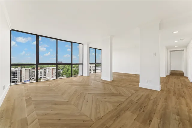 a view of an empty room and window