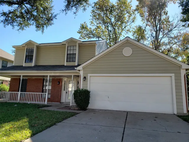 a view of a back yard of the house