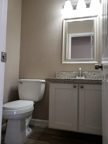 a view of a backyard with a plants and trees