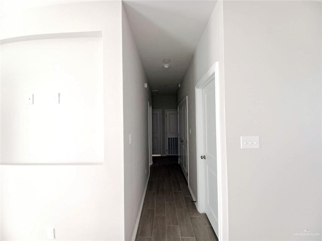 1630 Playa Drive, Unit 1 Weslaco, TX 78596 - Photo 6 of 13 a view of a hallway