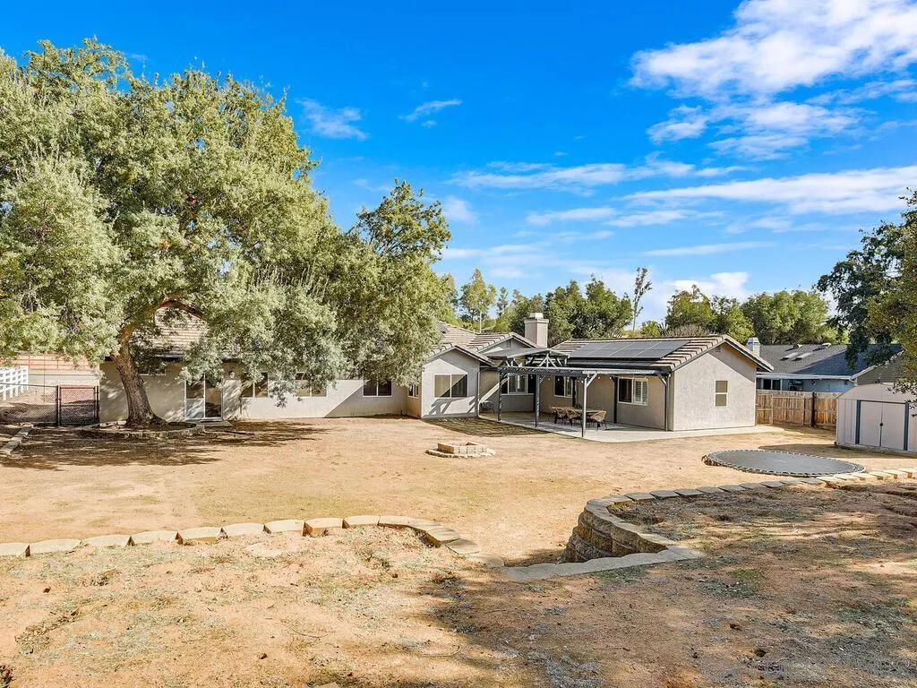 16304 Dartolo Road Ramona, CA 92065 - Photo 28 of 36 a view of a house with snow on the background