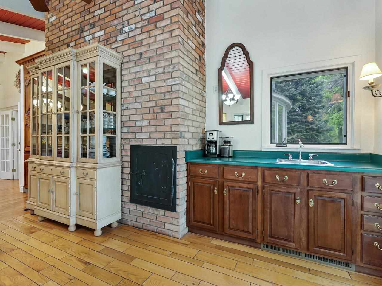 662 26 Road Grand Junction, CO 81506 - Photo 12 of 42 a spacious bathroom with a granite countertop sink and a mirror