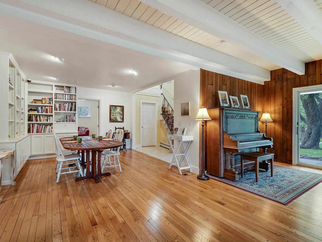 662 26 Road Grand Junction, CO 81506 - Photo 8 of 42 a living room with furniture and a wooden floor