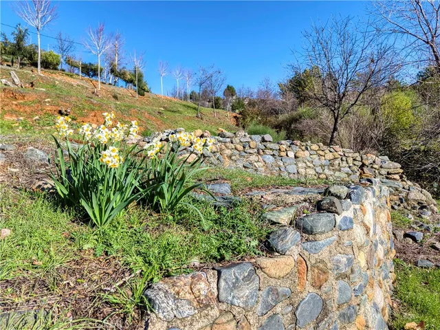 an aerial view of residential house and outdoor space