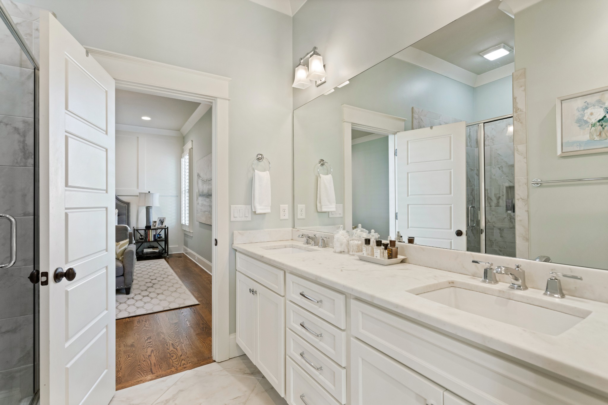 611 Estes Road Nashville, TN 37215 - Photo 13 of 27 a spacious en suite bathroom with double sink and a mirror