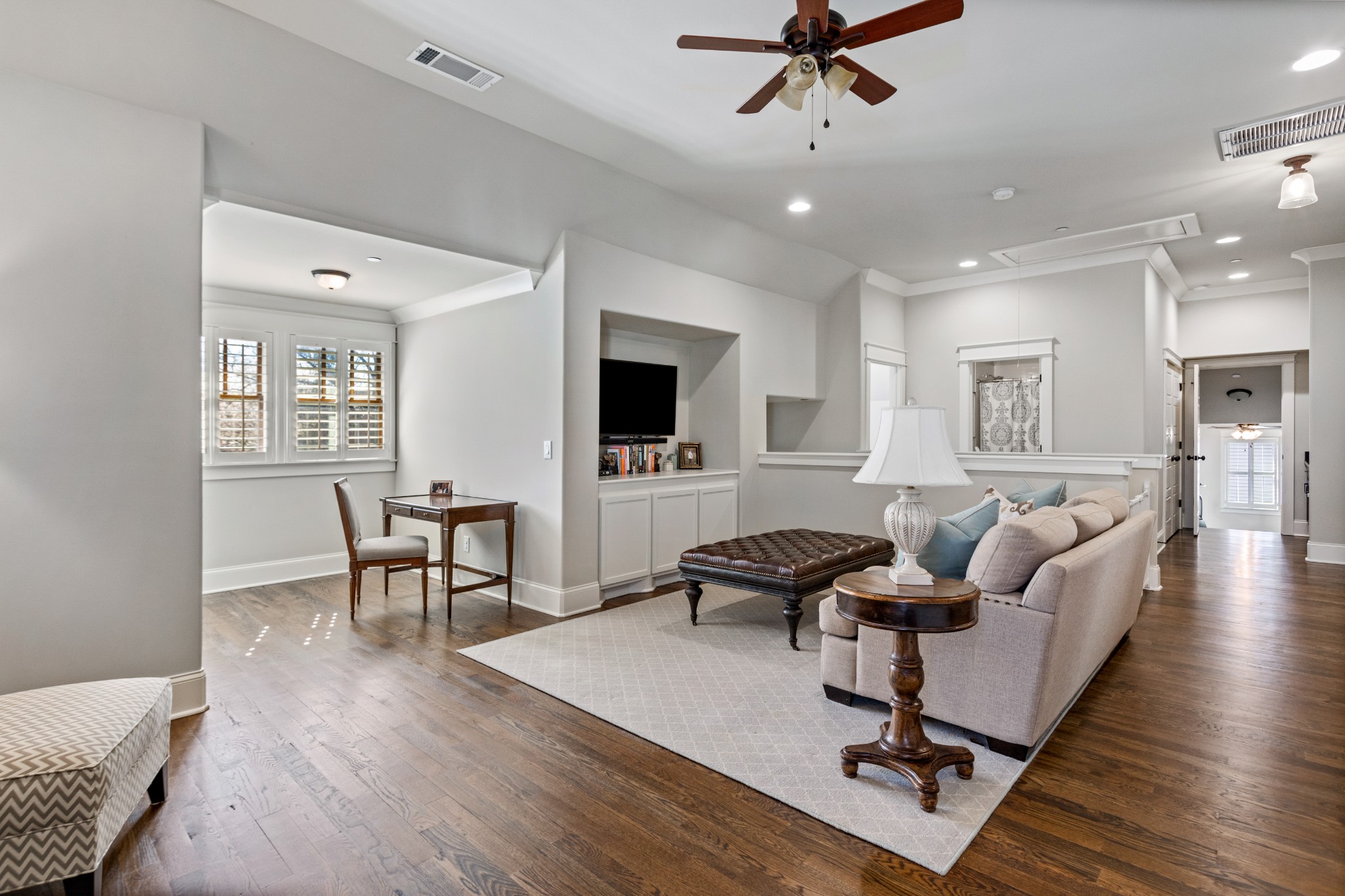 611 Estes Road Nashville, TN 37215 - Photo 15 of 27 a living room with furniture and a flat screen tv with wooden floor