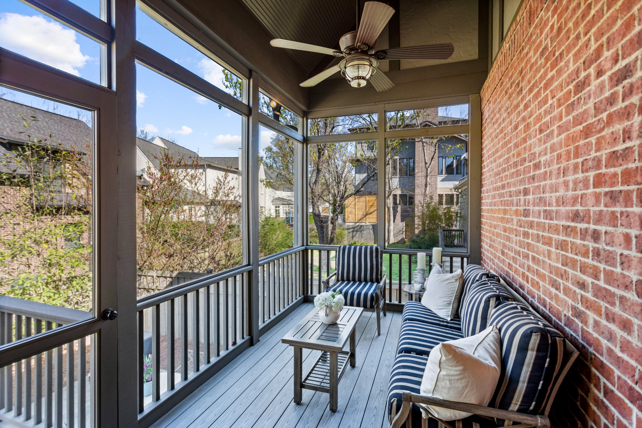 611 Estes Road Nashville, TN 37215 - Photo 25 of 27 a view of a porch with furniture and a floor to ceiling window