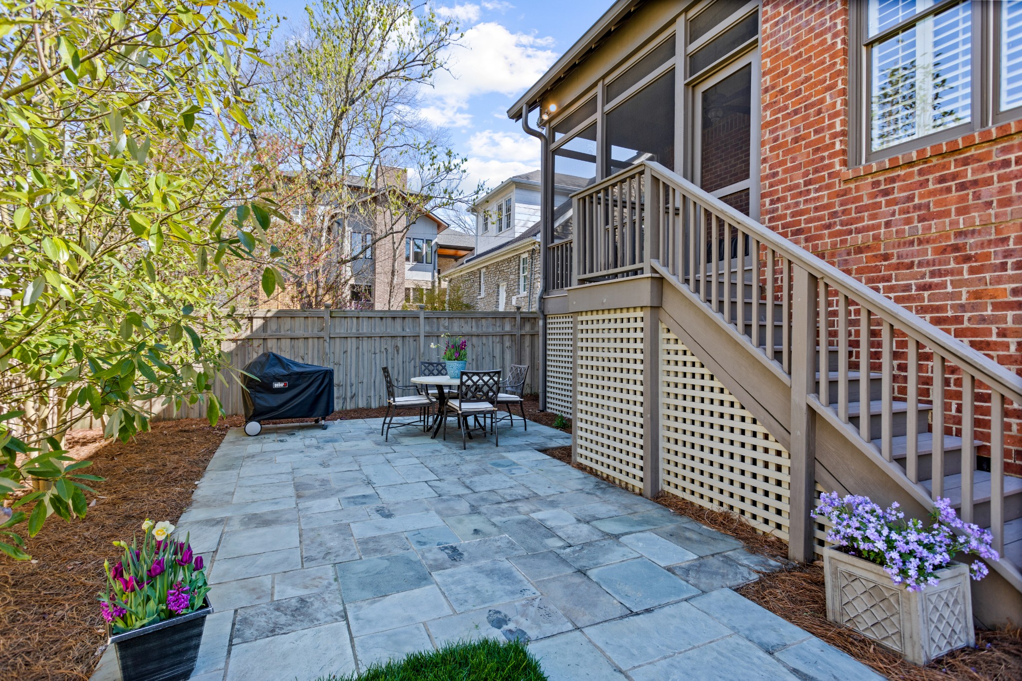 611 Estes Road Nashville, TN 37215 - Photo 26 of 27 a view of house with wooden deck and furniture